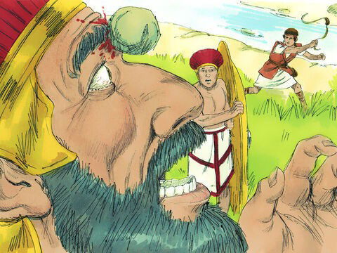 O gigante Golias é golpeado com uma pedrada na testa